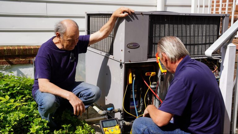 A/C Masters HVAC expert working on ac unit